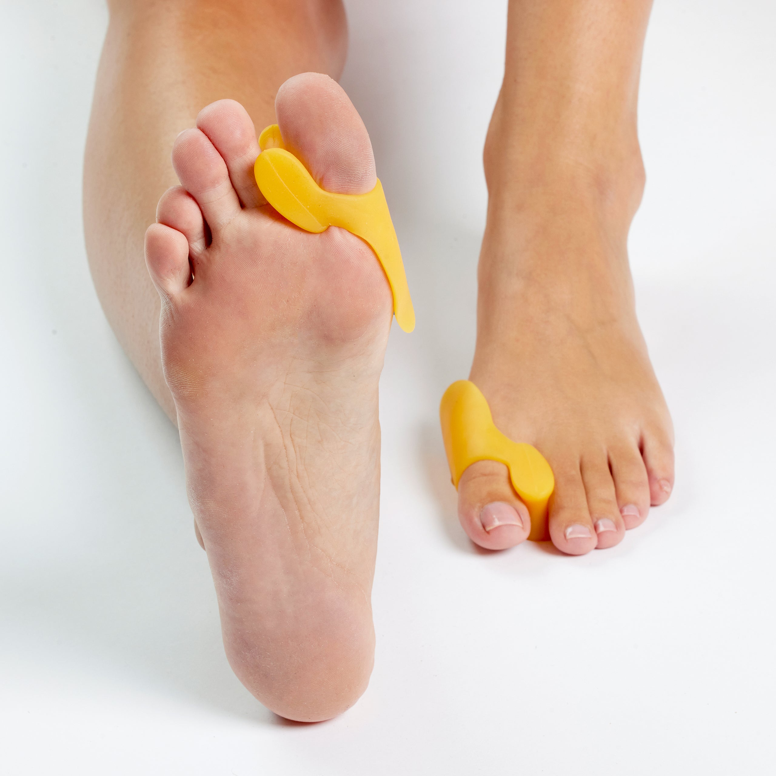 3-i-1 hallux valgus-beskyttelse med tåspreder og gelpute