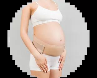 Gravid kvinne med støttebelte Gravid kvinne med støttebelte
